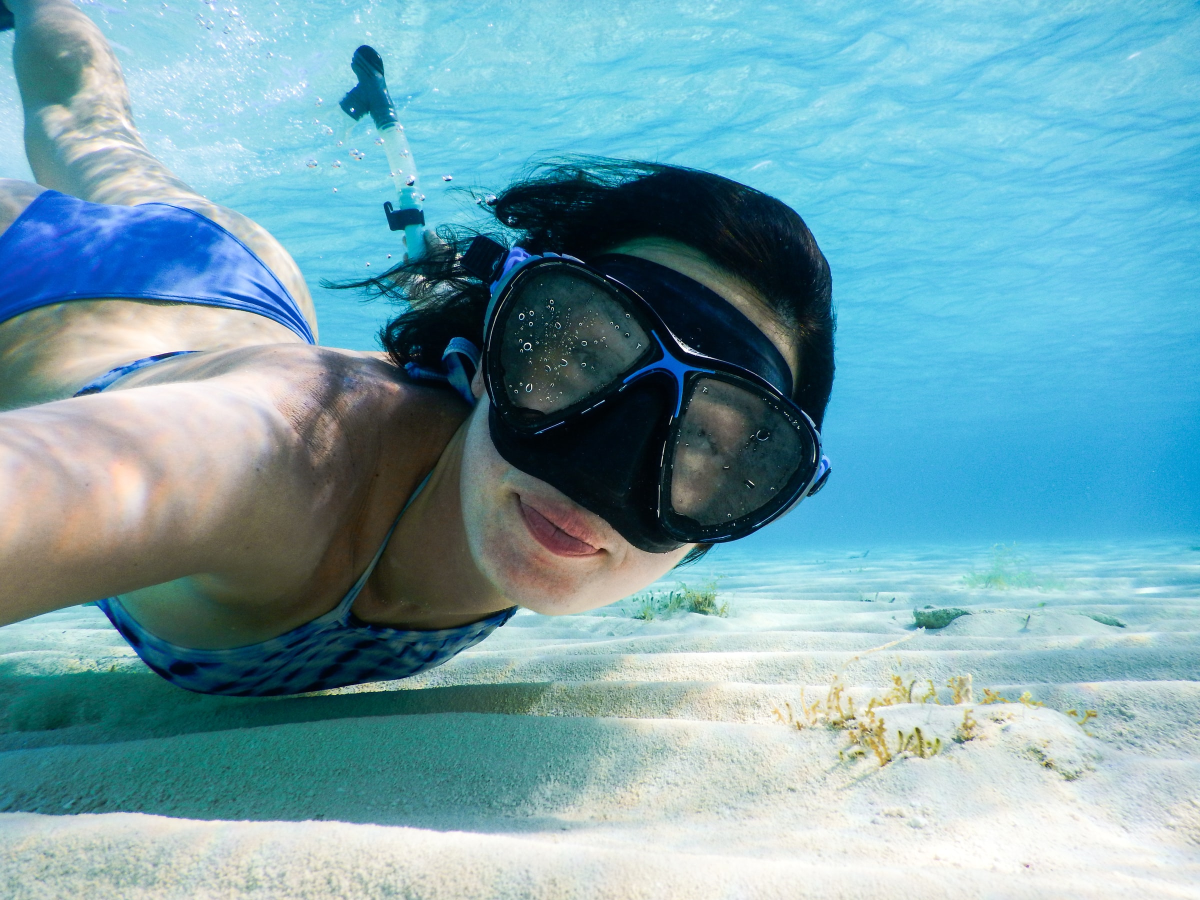 Women snorkeling in the waters of Saona Island