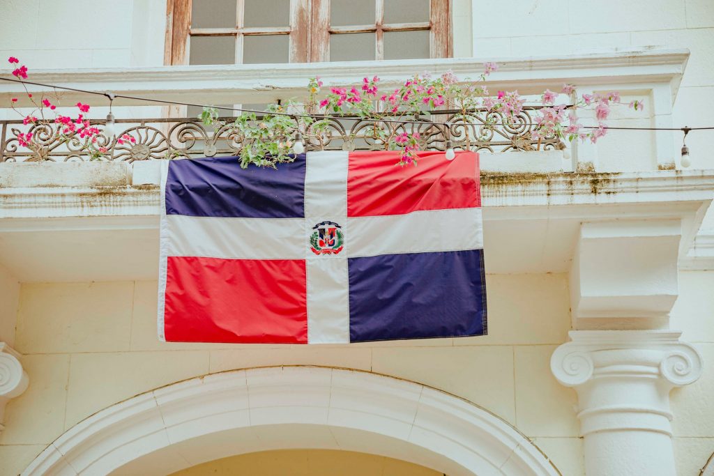Dominican Flag outside of colonial building
